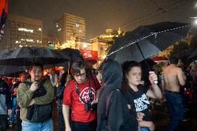 Demonstrators Shout Slogans As They Take Part In A Protest