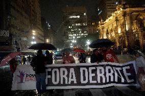 Demonstrators Shout Slogans As They Take Part In A Protest