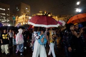 Demonstrators Shout Slogans As They Take Part In A Protest