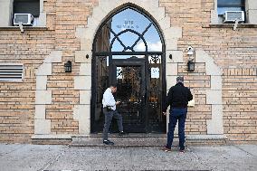 NYPD Investigators Inside Of 1479 Macombs Rd. In Mount Eden Section Of Bronx New York Following Stabbing Death Of A Woman And Ma