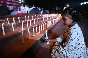 Lighting Candles In Memory Of Victim In Dhaka.