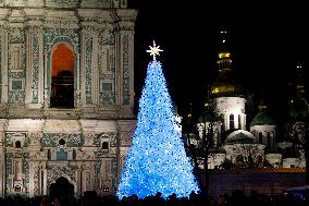 Ukraines main Christmas tree lit up in Kyiv