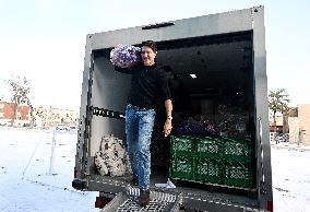 Justin Trudeau Packs Cristmas Baskets In Montreal