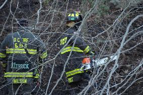 Washington DC Fire Fighters Battle A Brush Fire In Rock Creek Park In The Middle Of The City On December 7, 2024.