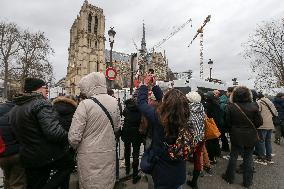 People Gather For Notre-Dame De Paris Cathedral Official Reopening Ceremony