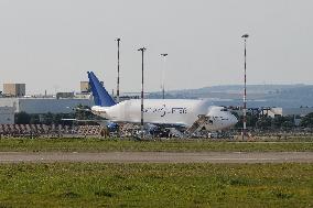 Boeing Dreamlifter At Taranto-Grottaglie Airport During Cargo Operations