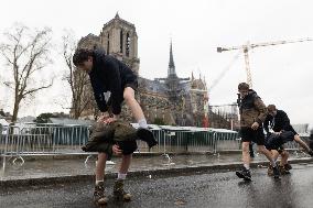 People attend the first mass outside Notre Dame Cathedral - Paris