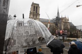 People attend the first mass outside Notre Dame Cathedral - Paris