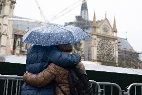 People attend the first mass outside Notre Dame Cathedral - Paris