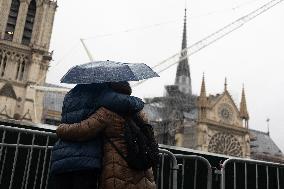 People attend the first mass outside Notre Dame Cathedral - Paris