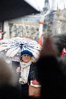 People attend the first mass outside Notre Dame Cathedral - Paris