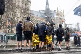 People attend the first mass outside Notre Dame Cathedral - Paris