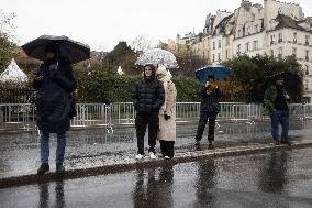 People attend the first mass outside Notre Dame Cathedral - Paris