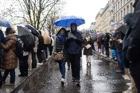 People attend the first mass outside Notre Dame Cathedral - Paris