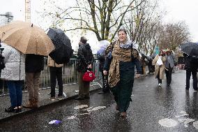 People attend the first mass outside Notre Dame Cathedral - Paris