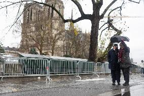 People attend the first mass outside Notre Dame Cathedral - Paris