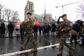 People attend the first mass outside Notre Dame Cathedral - Paris