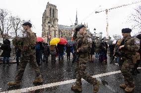 People attend the first mass outside Notre Dame Cathedral - Paris