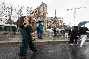 People attend the first mass outside Notre Dame Cathedral - Paris