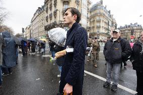 People attend the first mass outside Notre Dame Cathedral - Paris