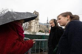 People attend the first mass outside Notre Dame Cathedral - Paris