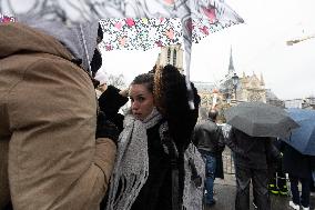 People attend the first mass outside Notre Dame Cathedral - Paris