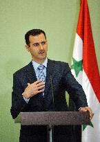 Nicolas Sarkozy meets Bachar al-Assad  in Damascus