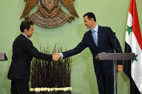 Nicolas Sarkozy meets Bachar al-Assad  in Damascus