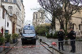 People attend the first mass outside Notre Dame Cathedral - Paris