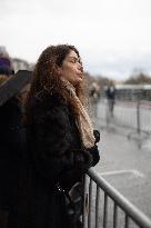 People attend the first mass outside Notre Dame Cathedral - Paris