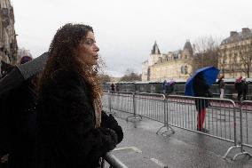 People attend the first mass outside Notre Dame Cathedral - Paris