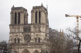 People attend the first mass outside Notre Dame Cathedral - Paris