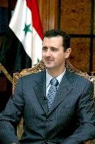 Syrian President Bashar El Assad gives an interview to French journalist Christian Malar