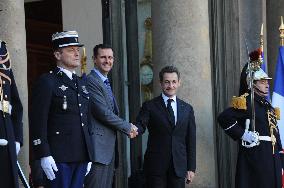 Nicolas Sarkozy receives Bashar al-Assad at Elysee Palace in Paris