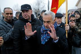 Calin Georgescu, Supporters Protest Outside Bucharest Polling Station After Runoff Scrapped