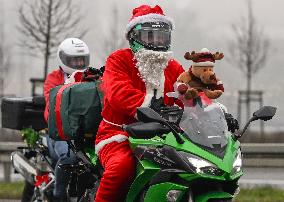 Santas On Wheels Bring Gifts To Kids In Need