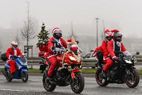 Santas On Wheels Bring Gifts To Kids In Need