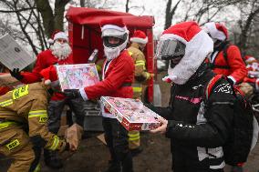 Santas On Wheels Bring Gifts To Kids In Need