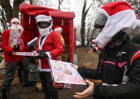 Santas On Wheels Bring Gifts To Kids In Need