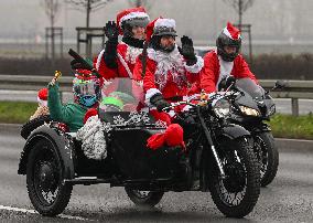 Santas On Wheels Bring Gifts To Kids In Need