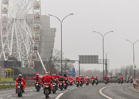 Santas On Wheels Bring Gifts To Kids In Need