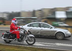 Santas On Wheels Bring Gifts To Kids In Need