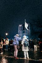 People attend the second mass outside Notre Dame Cathedral - Paris