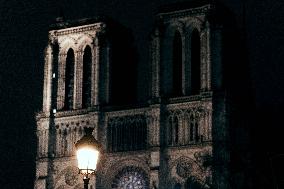 People attend the second mass outside Notre Dame Cathedral - Paris