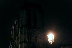 People attend the second mass outside Notre Dame Cathedral - Paris