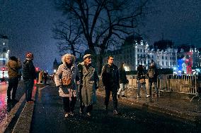 People attend the second mass outside Notre Dame Cathedral - Paris