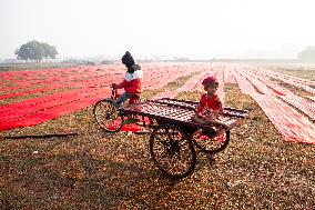 Red Cloth Production In Bangladesh