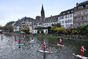 Santa Clauses Parade on Paddleboards - Strasbourg