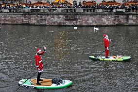 Santa Clauses Parade on Paddleboards - Strasbourg