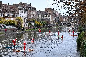 Santa Clauses Parade on Paddleboards - Strasbourg